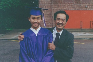 Kenneth and his father on his graduation day