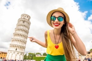 woman in front of tower of pisa, italy