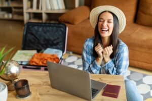 happy woman getting cheap flights