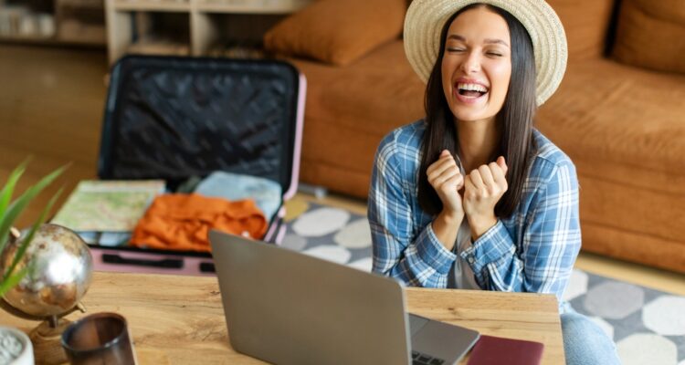 happy woman getting cheap flights