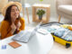 woman celebrating cheap flight day