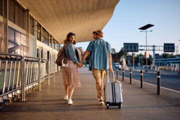 Happy couple of tourists