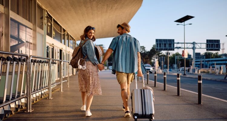 Happy couple of tourists