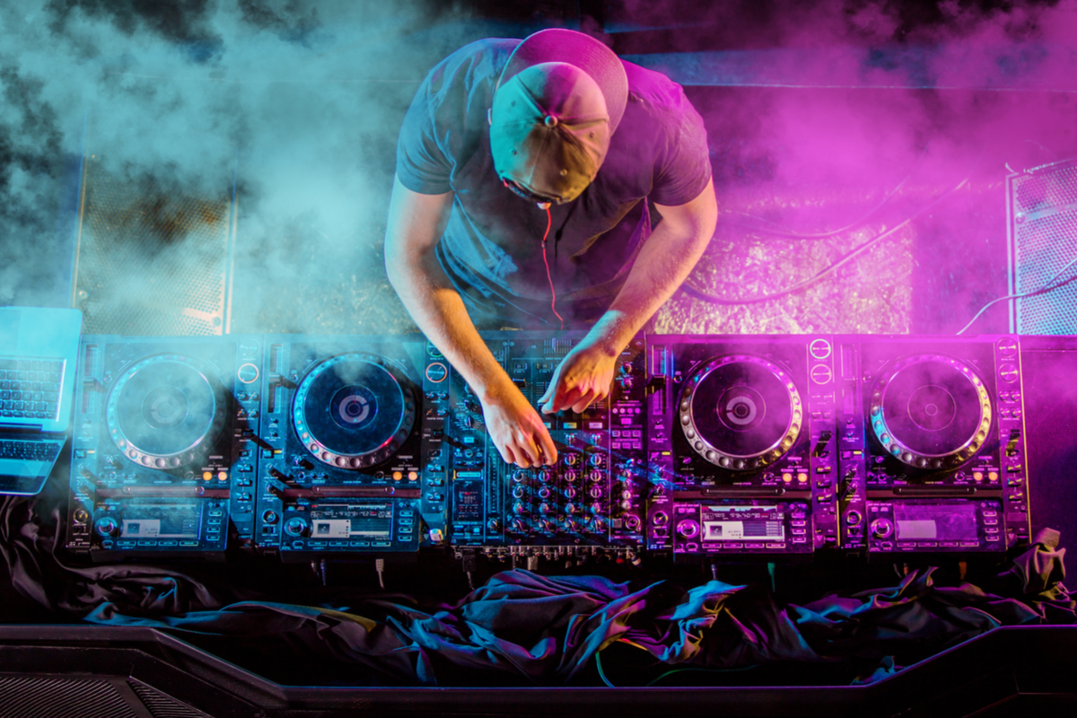 Charismatic disc jockey at the turntable.