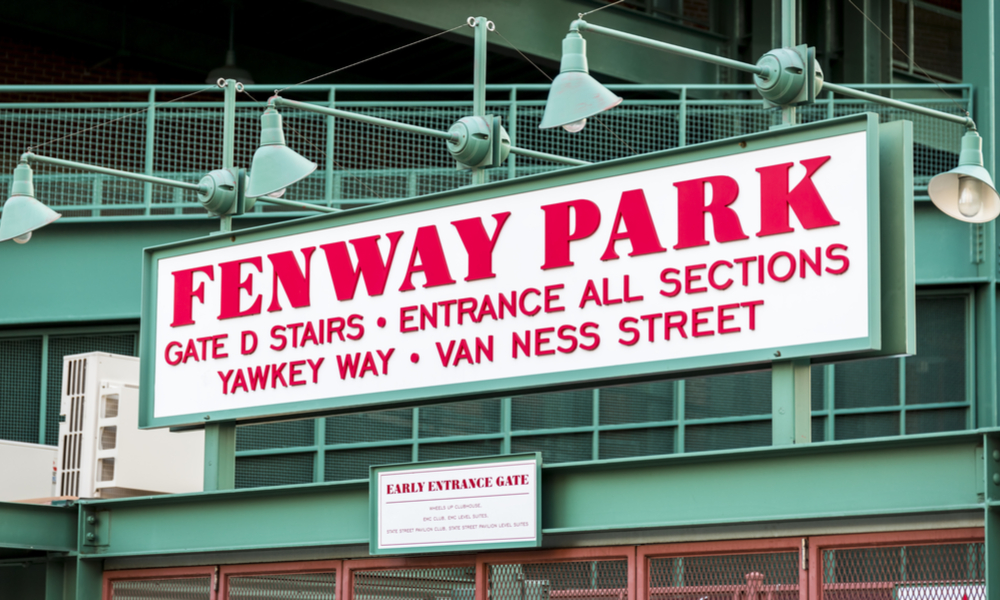 The architecture of the historic Fenway Park Stadium in Boston, MA, USA showcasing one of its signs at the ticket booths